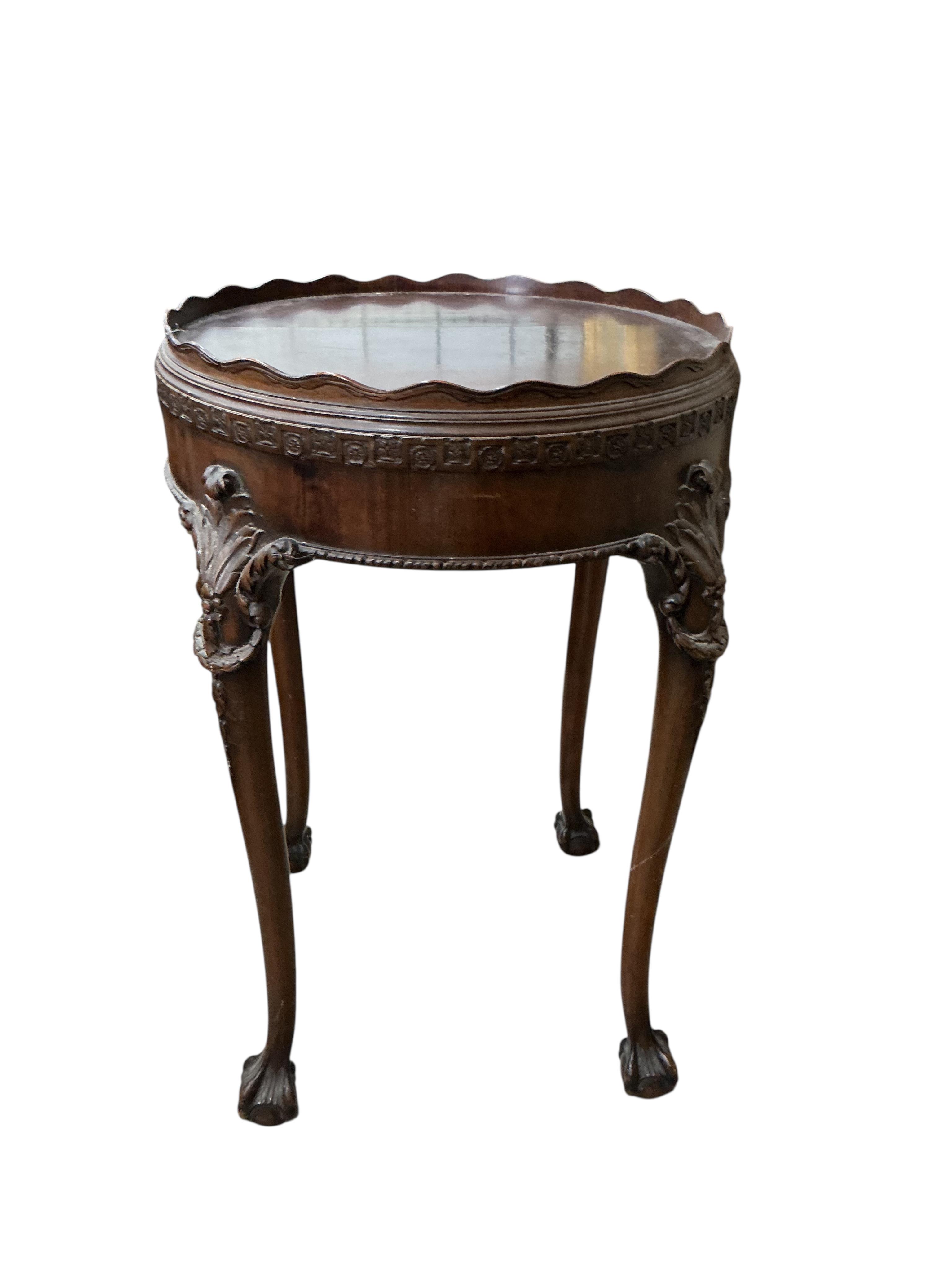 An early 20th century George III style circular mahogany centre table, diameter 52cm, height 79cm